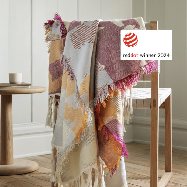 red dot award logo on picture of blanket
